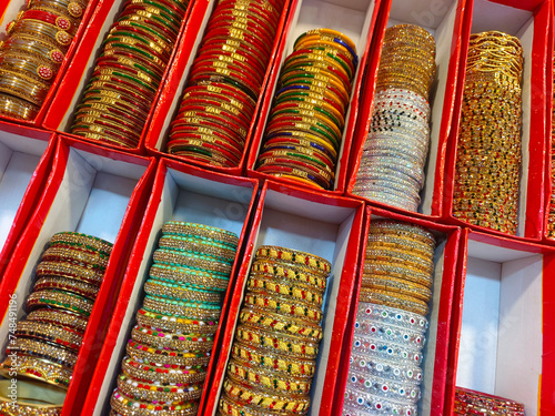 Indian colorful bangles displayed in local shop in a market of Indore, India, These bangles are made of Glass used as beauty accessories by Indian women.