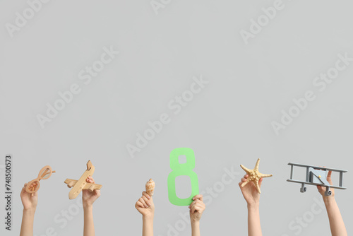 Female hands with paper fig...