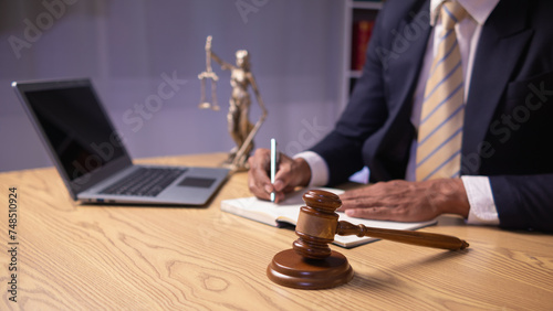 Photography A judge gavel is prepared in the courtroom to be used to give a signal when the verdict is read after the trial is completed