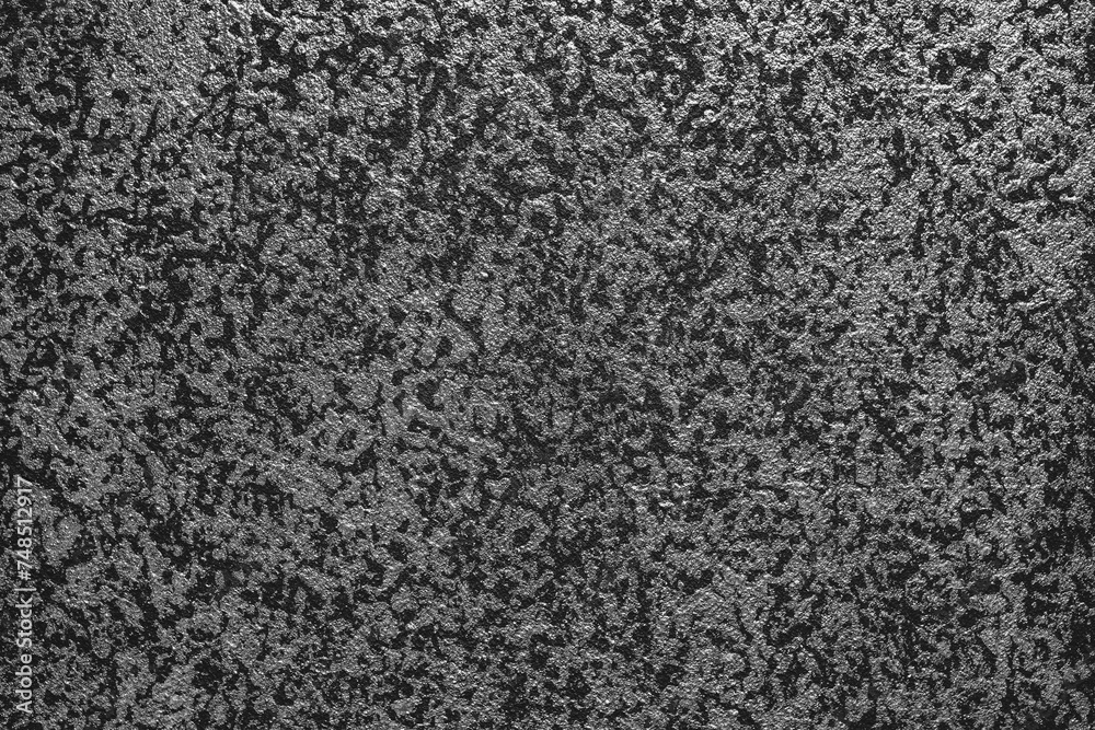 Fototapeta premium Dark grey spotted wall in the room 
