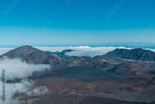 Cinder cone at Haleakala crater or the East Maui Volcano, is a massive, active shield volcano that forms more than 75% of the Hawaiian Island of Maui.