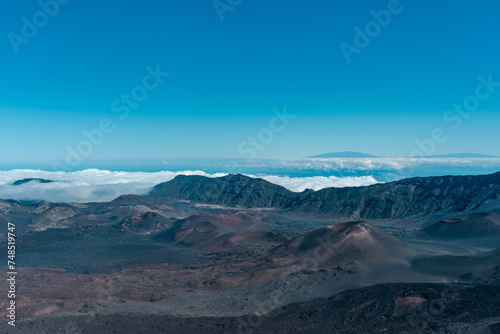 Cinder cone at Haleakala crater or the East Maui Volcano  is a massive  active shield volcano that forms more than 75  of the Hawaiian Island of Maui.