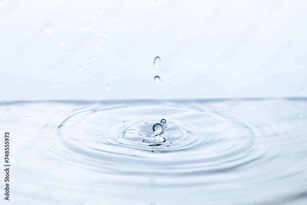 Captivating shot of a pristine water droplet reflecting light, symbolizing purity and clarity. Ideal for environmental campaigns or wellness-themed designs. Captivating shot of a pristine water droplet reflecting light, symbolizing purity and clarity. Ideal for environmental campaigns or wellness-themed designs.
