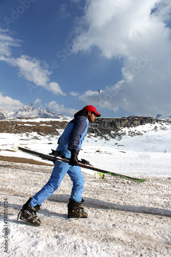 Men at snow mountains for snow skating at manali photo