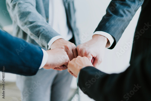 Tableau sur toile Cooperation, teamwork, and unity within the business organization show cooperation in working