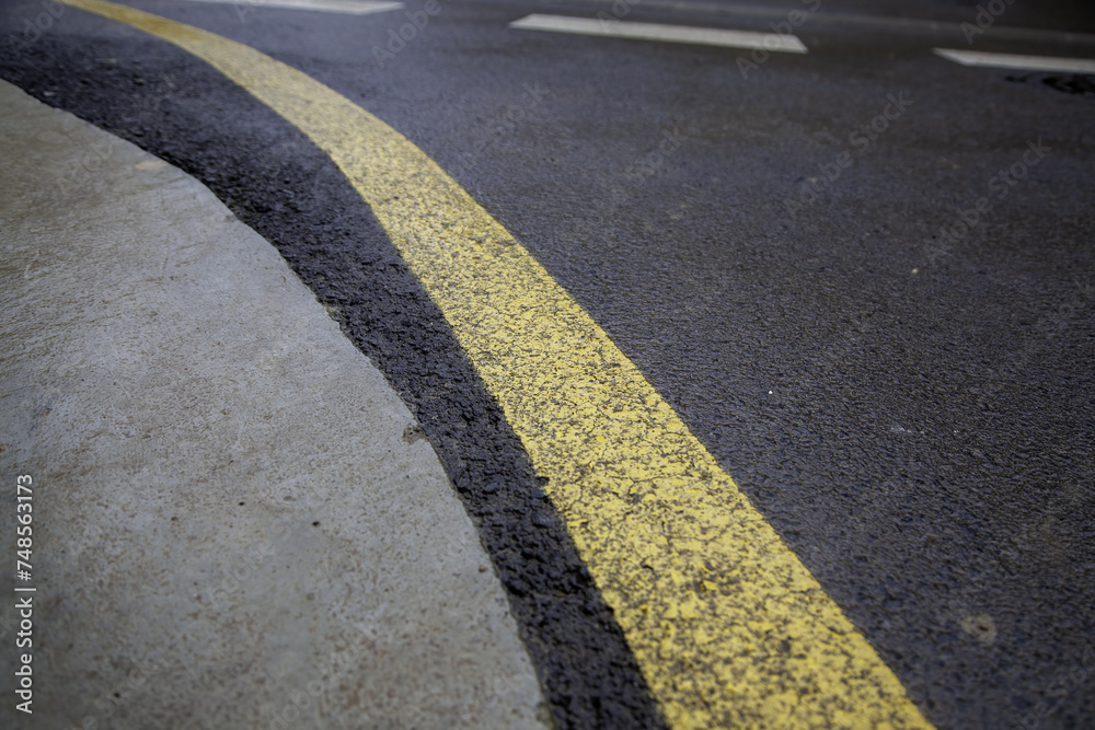 Yellow line on the asphalt