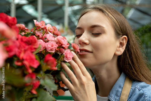 The girl is a green house worker.