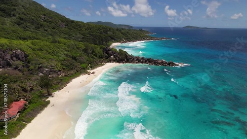 This paradisiacal beach in the Seychelles is also used as a Windows background. photo