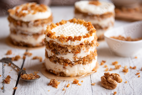 Small carrot cakes on white background