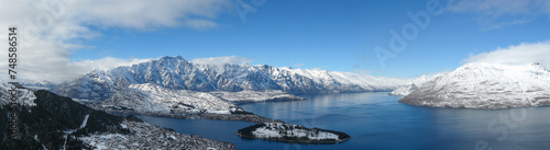 Aerial panoramic winter view of Queenstown, Lake Wakatipu and the Remarkables mountain range in the Southern Alps on New Zealand's South Island photo