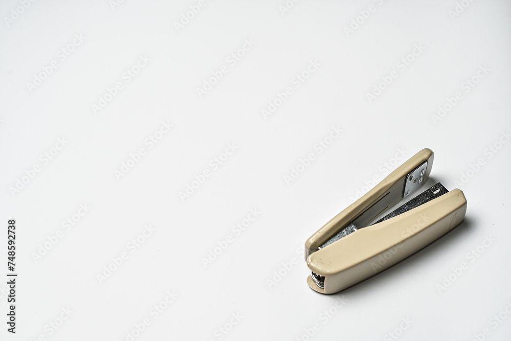 Stapler on white background