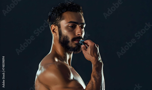 handsome man shave front of mirror