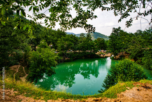 Serene Gol-e Ramian Spring Amidst Lush Greenery  Golestan  Iran