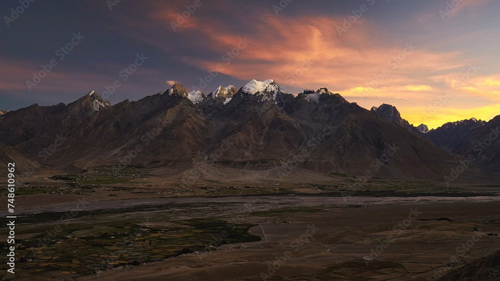 Zanskar valley after sunset with a glacier at the background