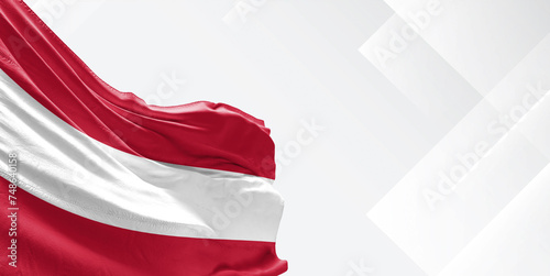 Austria national flag cloth fabric waving on beautiful white Background.