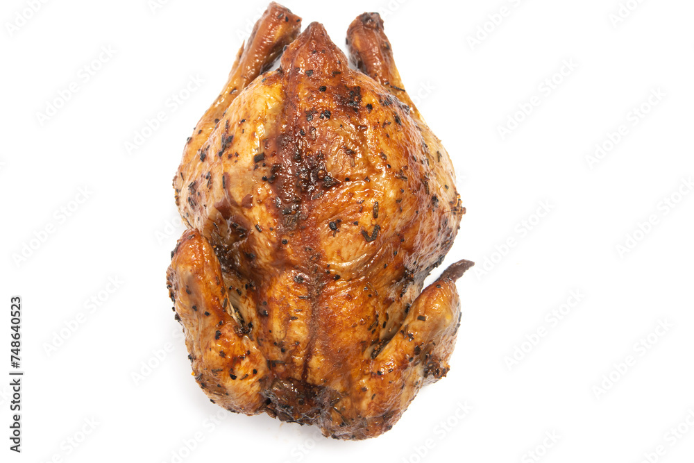 A whole delicious roasted chicken seasoned with herbs top view isolated on white background clipping path A whole delicious roasted chicken seasoned with herbs top view isolated on white background clipping path