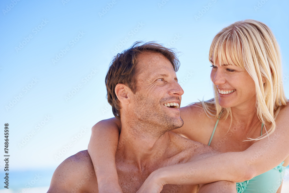 Love, hug and happy couple at a beach with support, gratitude and bonding in nature together. Travel, face and people embrace at the ocean for adventure, romance and summer fun or holiday in Jakarta Love, hug and happy couple at a beach with support, gratitude and bonding in nature together. Travel, face and people embrace at the ocean for adventure, romance and summer fun or holiday in Jakarta