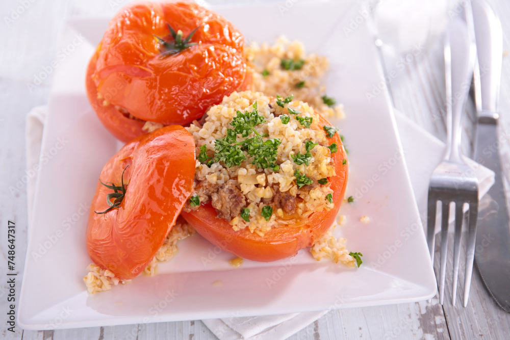baked tomato filling with bulgur and parsley- vegetarian dish baked tomato filling with bulgur and parsley- vegetarian dish