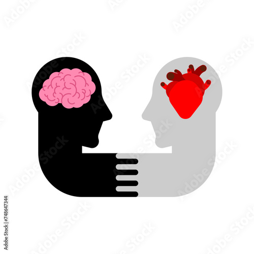 Heart and brain in two head. Mind or feelings concept. © maryvalery