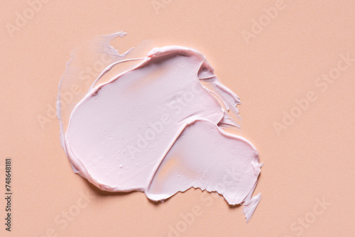 Pink cosmetic cream smudge swatch
