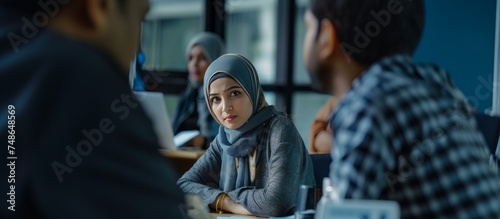 arab or Muslim business woman at work meeting