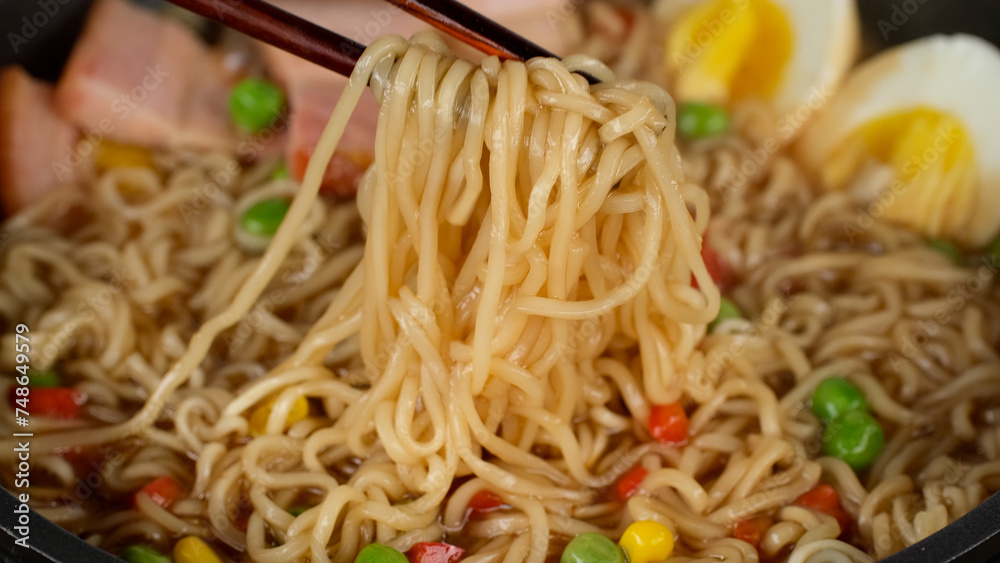 Tradition ramen noodles with eggs and bacon, close up Tradition ramen noodles with eggs and bacon, close up