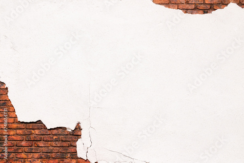 old crumbling white plaster, texture of peeling putty from a brick wall