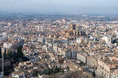 High level panoramic view over the city of Granada, Spain seen from the Alhambra palace with in the middle the Cathedral of Granada (Catedral de Granada) and Plaza Nueva de Granada