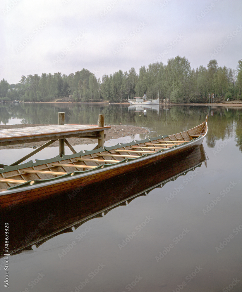 Obraz premium boat on the river,dalarna,sweden,sverige