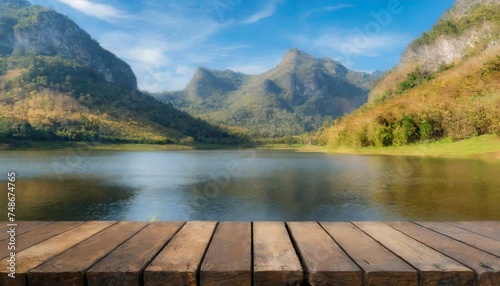 Rustic Retreat: Empty Wooden Table Set Against Autumn's Majestic Mountain Lake"