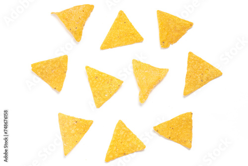 Separated group of crispy corn tortilla nachos chips isolated on white background clipping path