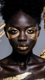 Stunning close-up portrait of a dark-skinned beautiful woman with abstract golden makeup. abstract wallpaper