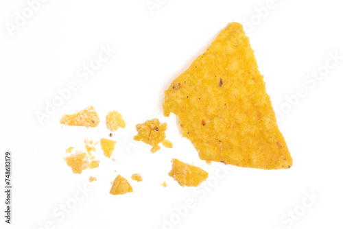 Crashed of crispy corn tortilla nachos chips with crumble isolated on white background clipping path