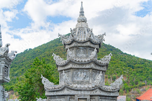 Bas-relief patterns of weather towers.
Thong Lam Lo Son Pagoda. Vietnam, a suburb of Nha Trang. The country's largest statue of Buddha Amitabha. photo