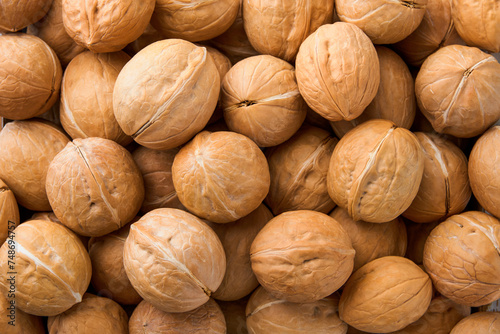 Walnut nuts texture. Food background. Top view. Close up.