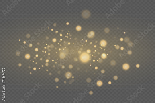 Christmas glowing background with sparkling dust and light  golden background. Bokeh effect  flickering glow with light confetti.