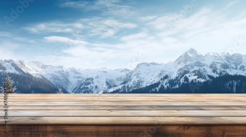 Wooden table top against the background of mountains