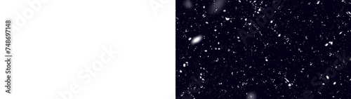 Real falling white snow. Black night sky in the winter. 