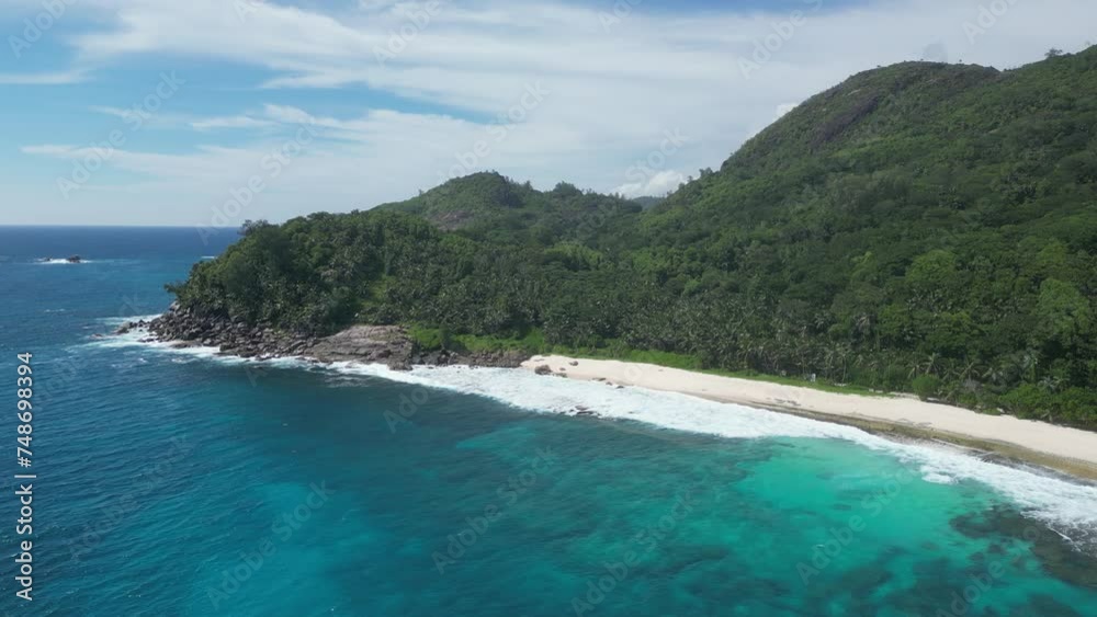 Anse Cocs beach, La Digue Seychelles, tropical beach during a luxury vacation in Seychelles. Tropical beach Anse Cocs beach, La Digue, Praslin, Mahe Seychelles with turqouse colored ocean Anse Cocs beach, La Digue Seychelles, tropical beach during a luxury vacation in Seychelles. Tropical beach Anse Cocs beach, La Digue, Praslin, Mahe Seychelles with turqouse colored ocean