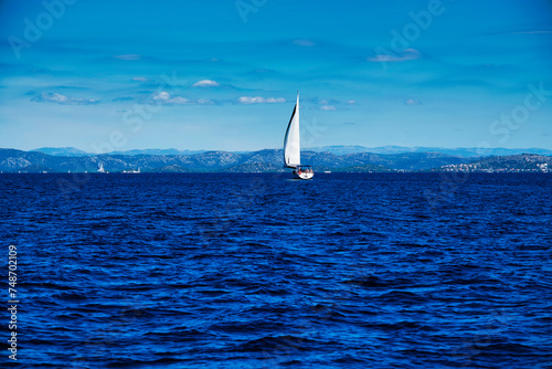 The White Sailing Boat is cruising the Adriatic Sea in Rogoznica Croatia.