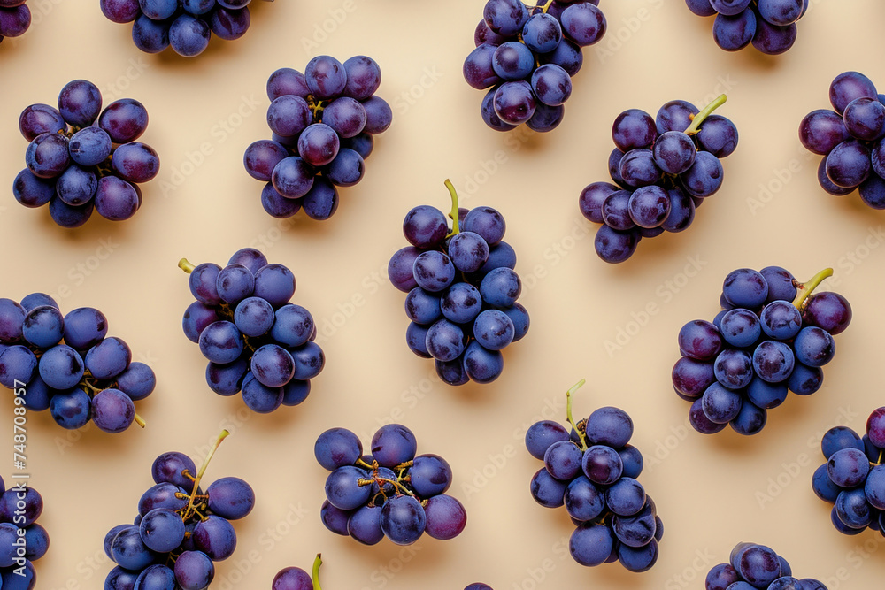 Fresh ripe grapes on a neutral beige background, arranged in a top view flat lay style - obrazy, fototapety, plakaty 