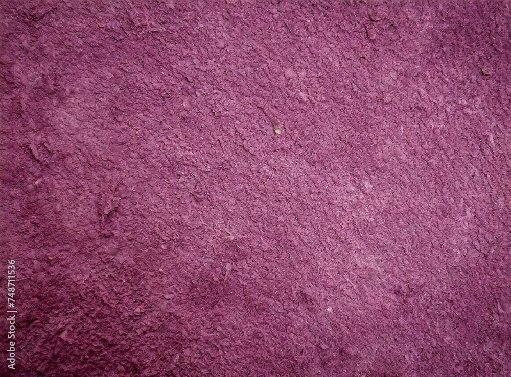Fototapeta premium Pink wall with rough texture background