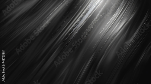 Light rays on a black background. The light rays are white and the background is black. photo