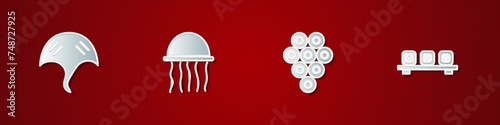 Set Stingray, Jellyfish, Caviar and Sushi on cutting board icon. Vector