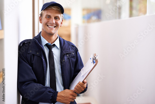 Delivery, checklist and portrait of man with clipboard for inventory, logistics and supply chain information. Happy, courier and person with survey of shipping, distribution or ecommerce compliance photo