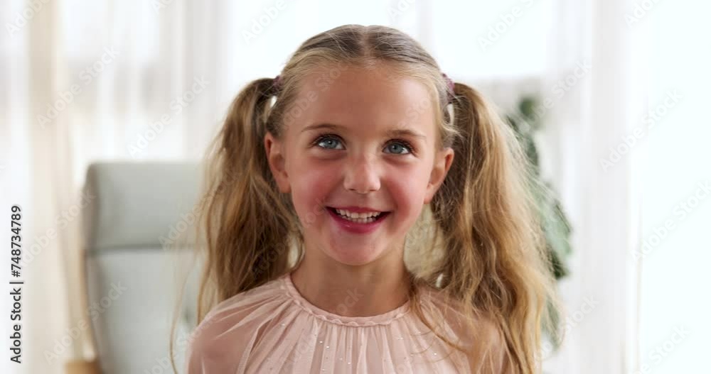 Smiling little girl of five years old looking at the camera and laughing with two ponytails in a pink dress close-up portrait standing at home. Child smiling looking up close up head shot Smiling little girl of five years old looking at the camera and laughing with two ponytails in a pink dress close-up portrait standing at home. Child smiling looking up close up head shot