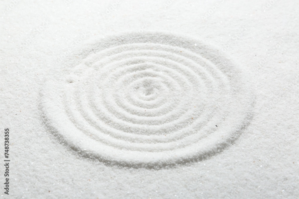 Zen rock garden. Circle pattern on white sand Zen rock garden. Circle pattern on white sand