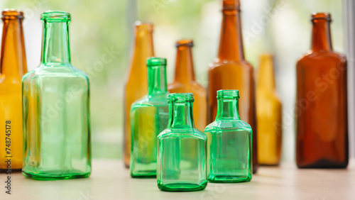 Colored Glass Bottles on Table