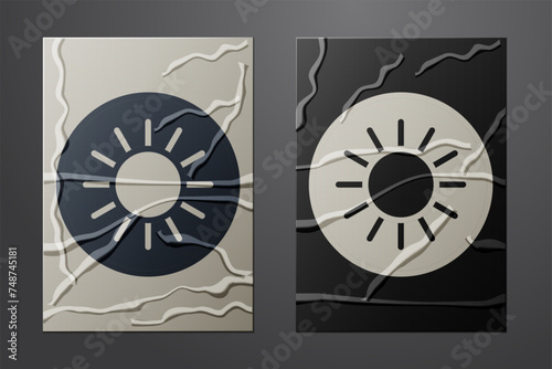 White Sun icon isolated on crumpled paper background. Paper art style. Vector