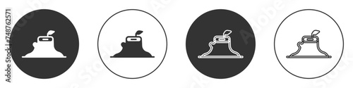 Black Tree stump icon isolated on white background. Circle button. Vector